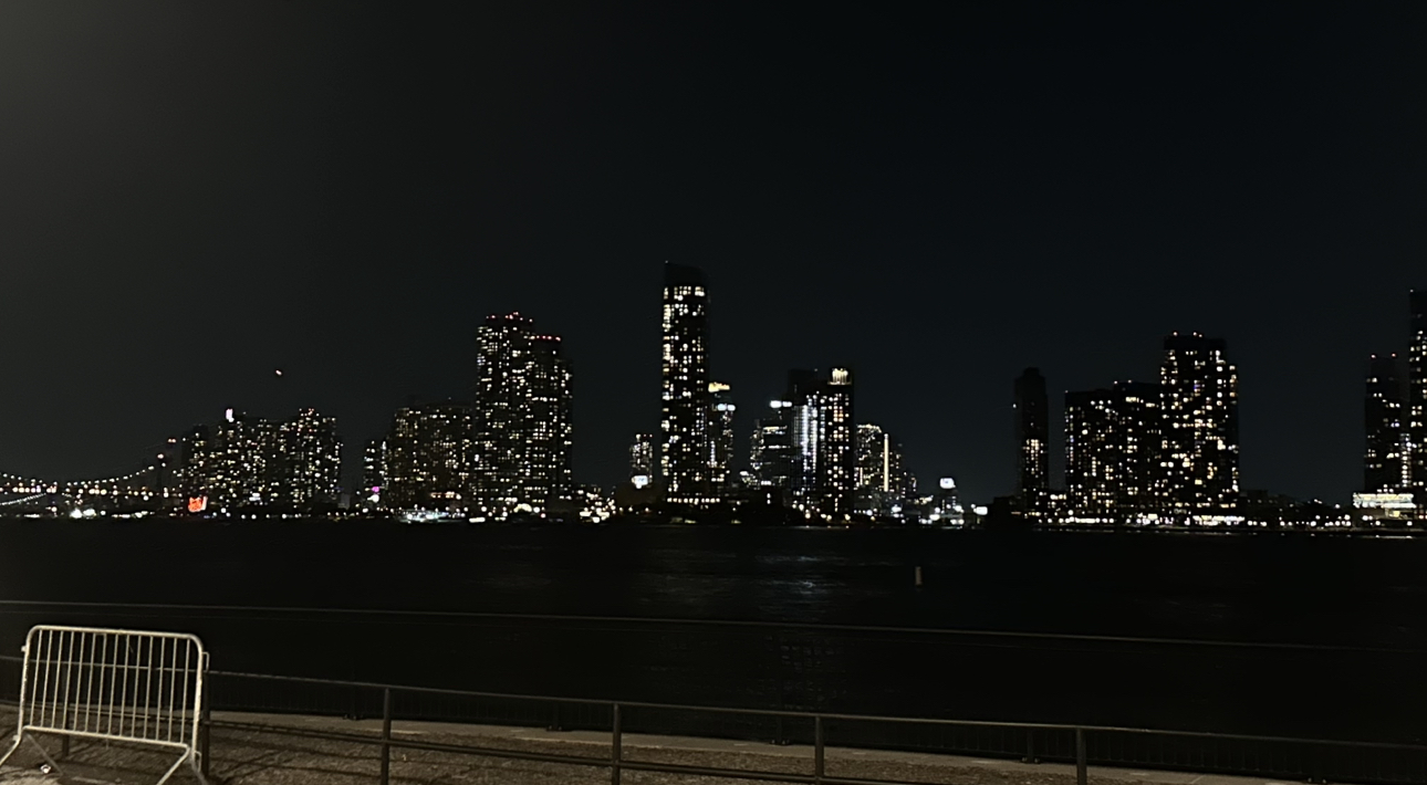 a photo of the east river in the night